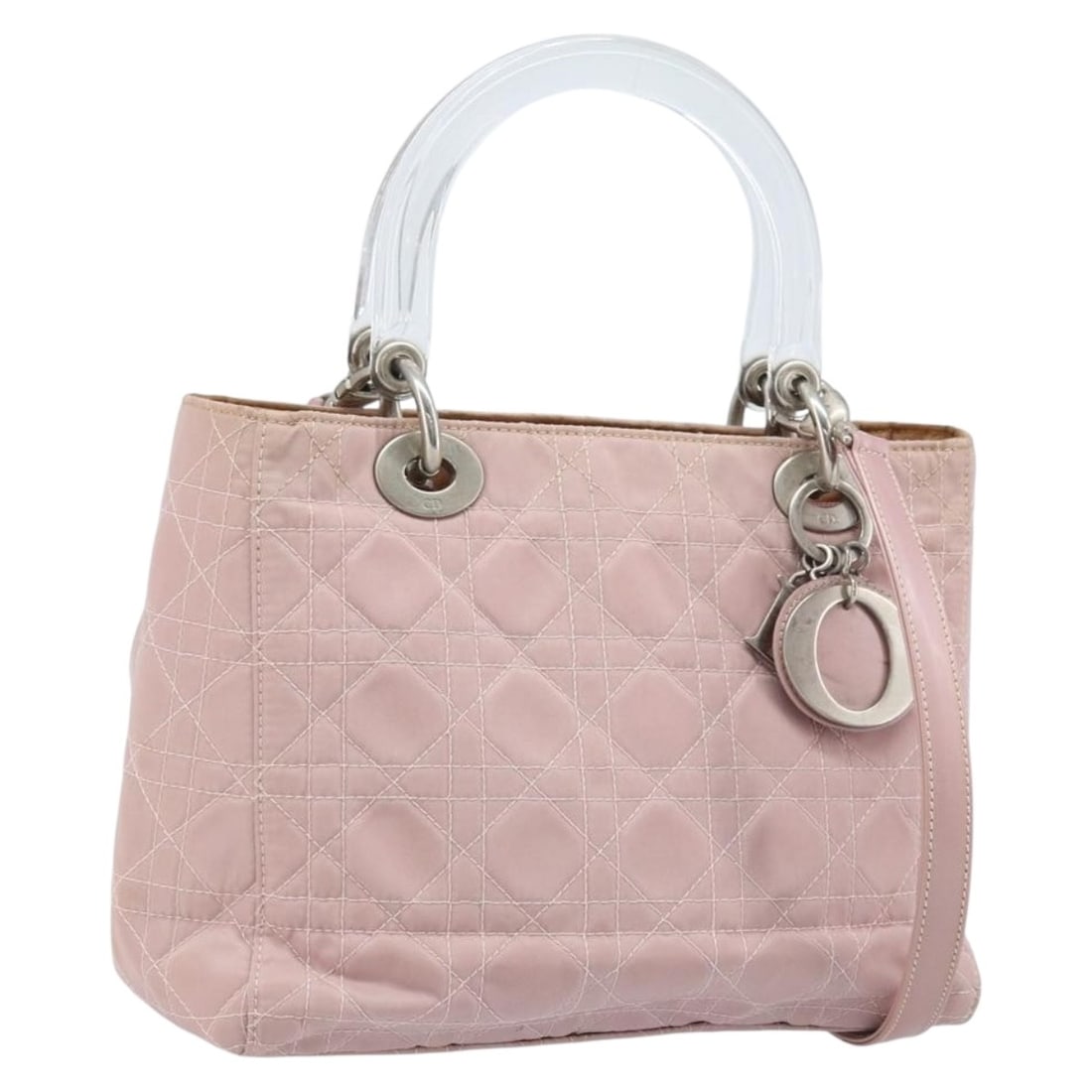 Christian Dior Cannage Pink Silver Nylon Handbag with Strap Charm: Christian Dior Cannage Pink Silver Nylon Handbag with Strap Charm This Christian Dior Canage handbag is crafted from pink and silver nylon and offers both hand and shoulder carrying options with its d