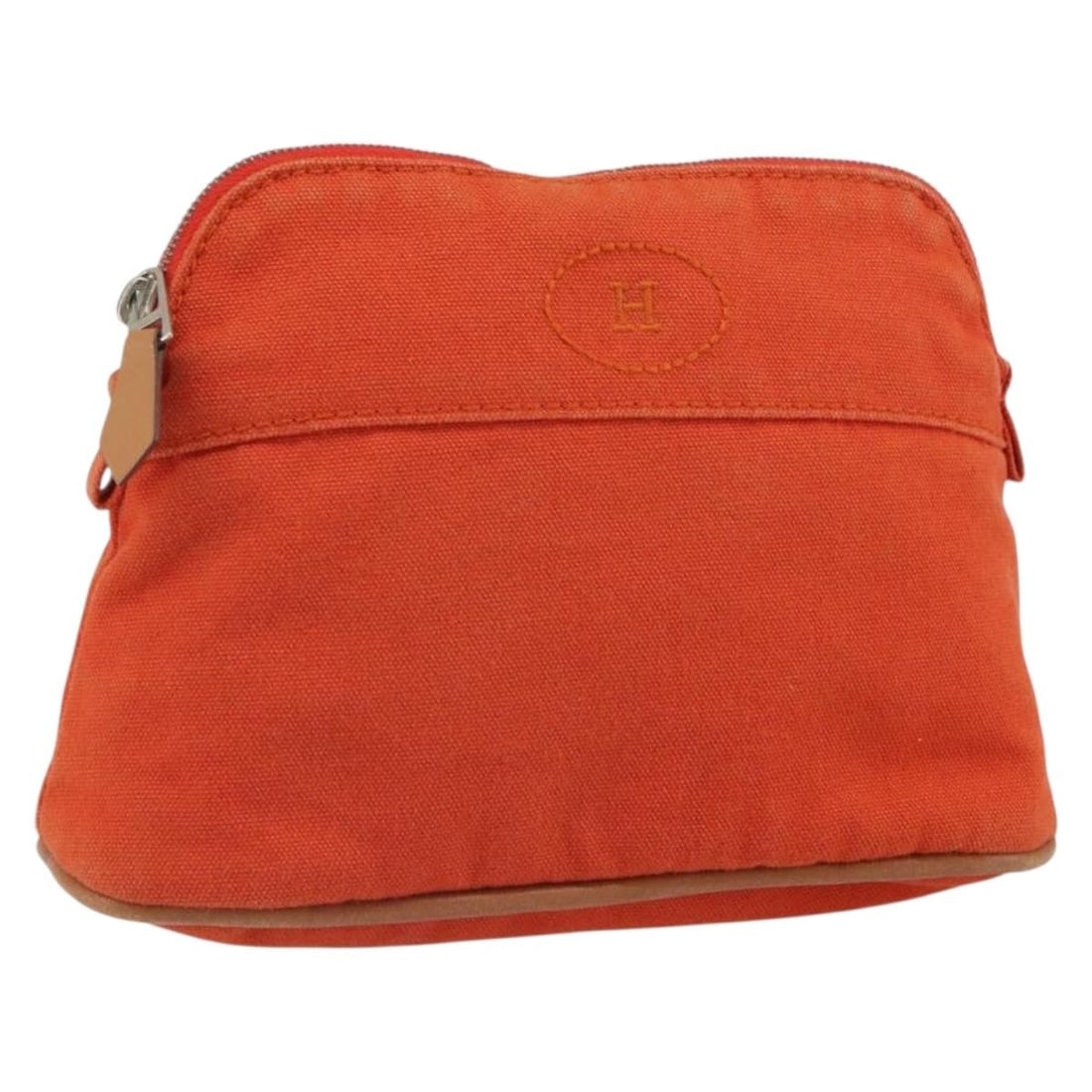 Hermes Bolide Orange Canvas Pouch with Silver Accents: Hermes Bolide Orange Canvas Pouch with Silver Accents This is a Hermes Bolide pouch crafted from orange and silver canvas. The pouch features a zip closure and is made in France. The item is heavily u
