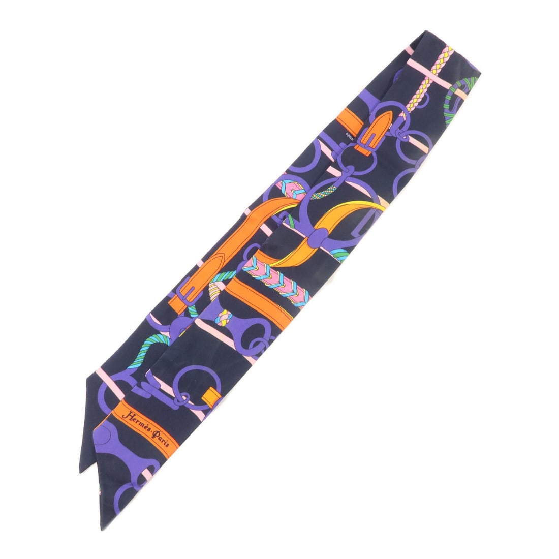 Hermes silk multicolor Twilly scarf: Hermes silk multicolor Twilly scarf This Hermes Twilly scarf is crafted from luxurious silk and features a vibrant multicolor design. Made in France, it is designed for women and offers a stylish acce