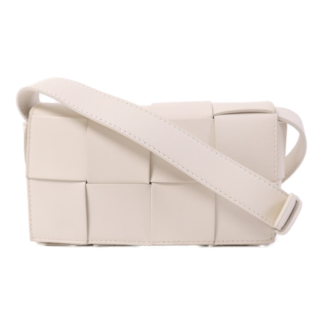 White Calfskin Bottega Veneta Cassette Shoulder Bag: White Calfskin Bottega Veneta Cassette Shoulder Bag This Bottega Veneta Cassette shoulder bag is crafted from white calfskin leather, offering a sophisticated and timeless design. Made in Italy, it is
