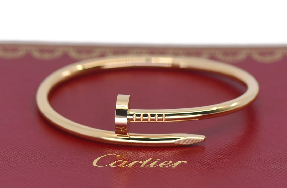 Cartier Juste un Clou Bangle 18k Rose Gold Size 16 Bracelet with Box: Cartier Juste un Clou Bangle 18k Rose Gold Size 16 Bracelet with Box This Cartier Juste un Clou bracelet is crafted in 18k rose gold and features a bangle design without a main stone. The bracelet is 