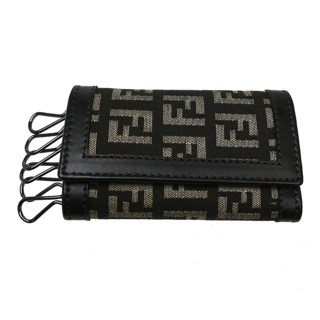 Fendi 2261.8AF002.JQN.049 canvas key case with 6 hooks: Fendi 2261.8AF002.JQN.049 canvas key case with 6 hooks Vintage Fendi six-hook key case in brown Zucca canvas with leather trim and a button logo accent. Made in Italy, this women's key case offers a c