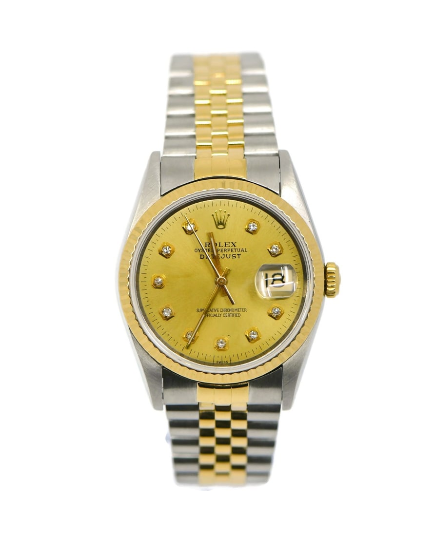 Champagne Dial Rolex Datejust 16233 18K Gold Stainless Steel Diamond Watch 36mm: Champagne Dial Rolex Datejust 16233 18K Gold Stainless Steel Diamond Watch 36mm This Rolex Datejust wristwatch features a 36 mm stainless steel case with 18K gold accents and a champagne dial set with