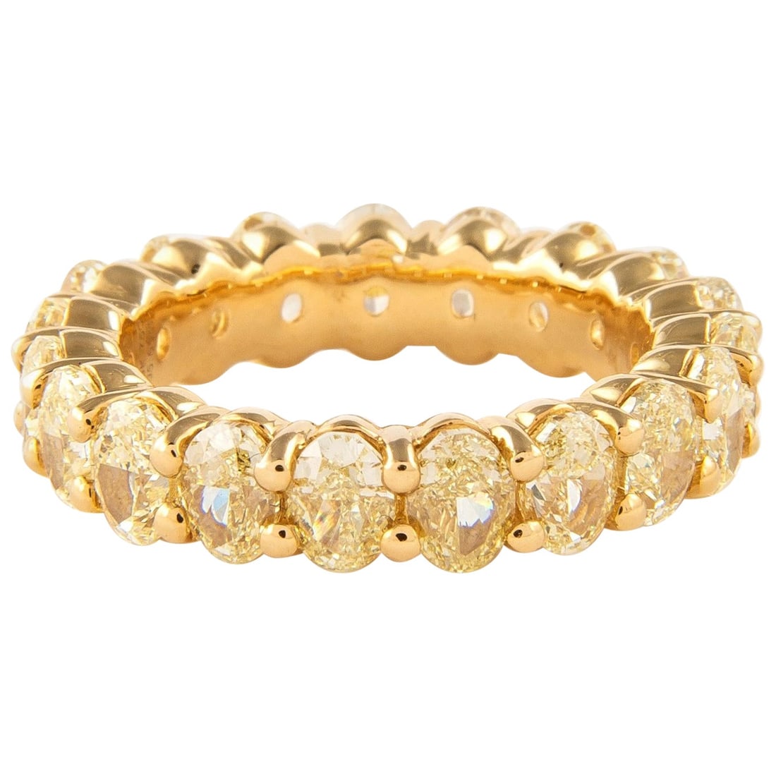 5.64ct Fancy Yellow Oval Diamond Eternity Band 18k Gold: 5.64ct Fancy Yellow Oval Diamond Eternity Band 18k Gold This stunning eternity band features 19 oval-shaped yellow diamonds totaling 5.64 carats, showcasing an approximately Fancy Yellow color and VS1