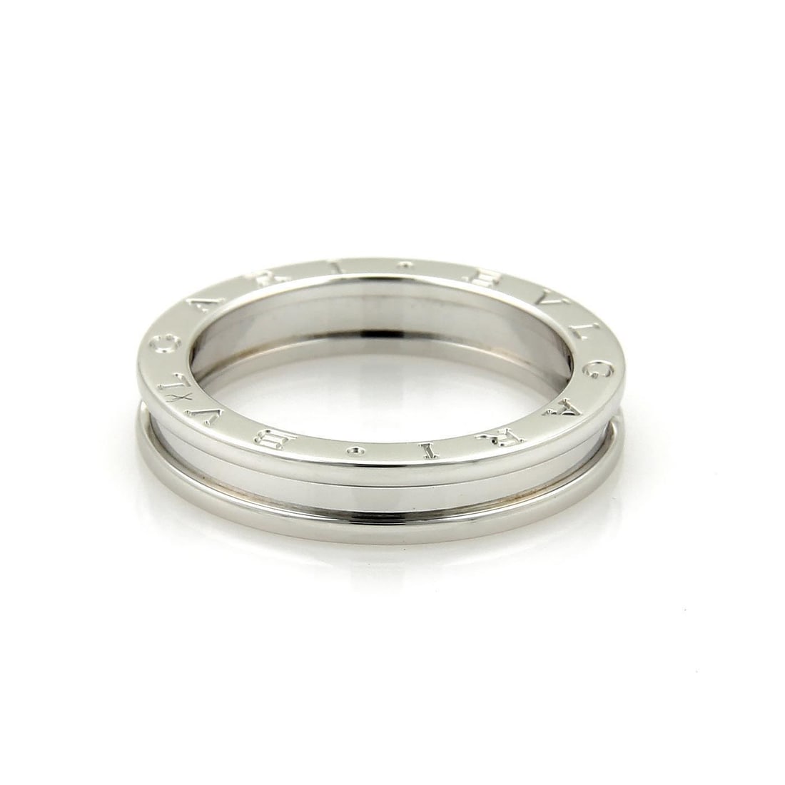 Bvlgari B Zero-1 18k White Gold Band Ring EU 50 US 5.25: Bvlgari B Zero-1 18k White Gold Band Ring EU 50 US 5.25 Introducing the stunning Bvlgari B Zero-1 Band Ring, a timeless piece from the renowned Bvlgari collection. This elegant ring is crafted from lu
