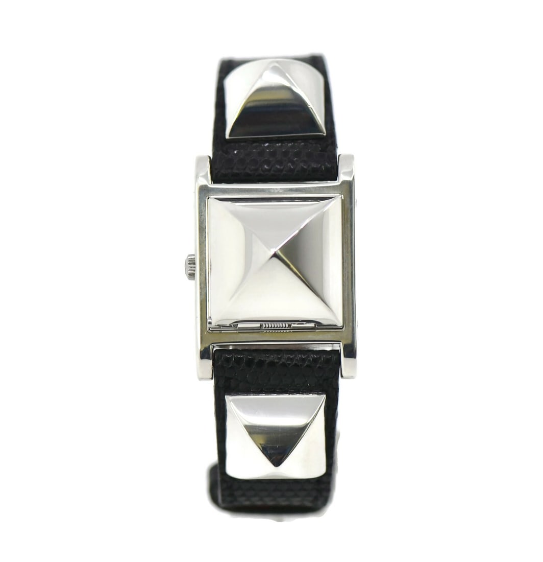 Hermes Medor Silver Watch ME1.250 Authentic Quartz Leather Band: Hermes Medor Silver Watch ME1.250 Authentic Quartz Leather Band The Hermes Medor Sterling Silver Watch ME1.250 is a luxurious wristwatch that combines elegance with functionality. This exquisite timep