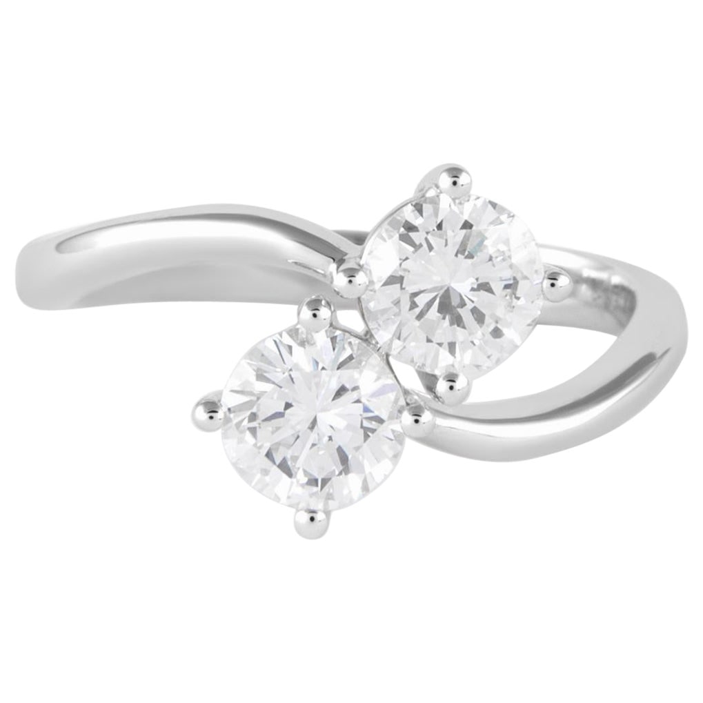 GIA Certified 1.03ct Toi Et Moi Diamond Ring in 18k White Gold: GIA Certified 1.03ct Toi Et Moi Diamond Ring in 18k White Gold Discover the exquisite beauty of this GIA certified Toi Et Moi ring featuring two stunning round brilliant diamonds. The total weight of 