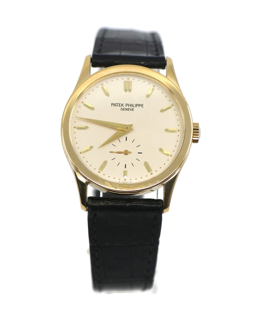 Patek Philippe Calatrava 5096J 18K Yellow Gold Wristwatch: Patek Philippe Calatrava 5096J 18K Yellow Gold Wristwatch This Patek Philippe Calatrava wristwatch, reference 5096J, features a 33.5mm case crafted from 18K yellow gold with a polished finish. It is p