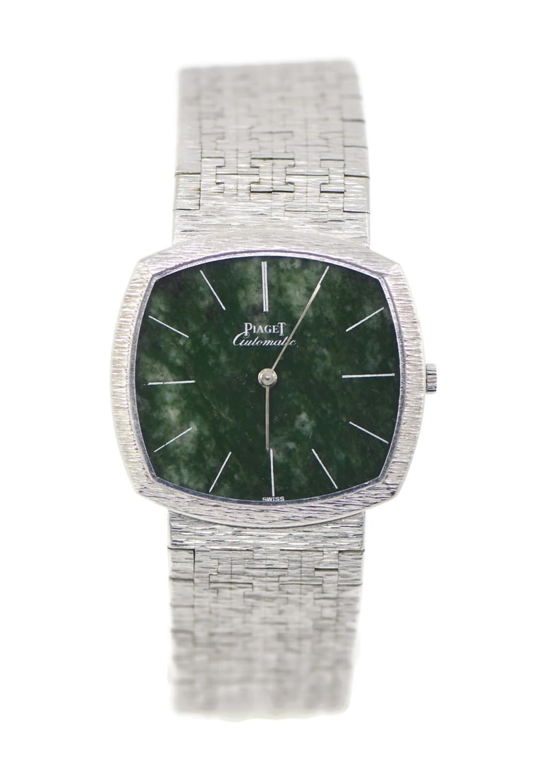 Piaget Jade 18K White Gold Mechanical Watch Ref 12401 Green Dial: Piaget Jade 18K White Gold Mechanical Watch Ref 12401 Green Dial This exquisite Piaget Jade wristwatch is crafted from 18K white gold, showcasing a stunning green dial that adds a unique touch. The wa
