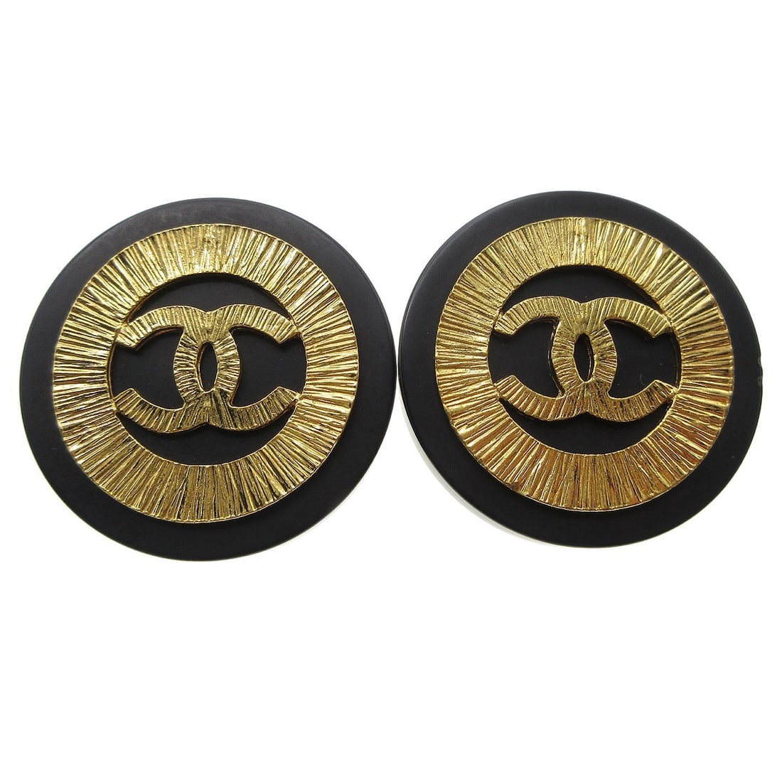 Chanel Button Clip On Earrings Black Plastic Gold Tone Logo: Chanel Button Clip On Earrings Black Plastic Gold Tone Logo Clip-on Chanel button motif earrings in black and gold-tone with a logo-themed design. These earrings feature a large round button shape and