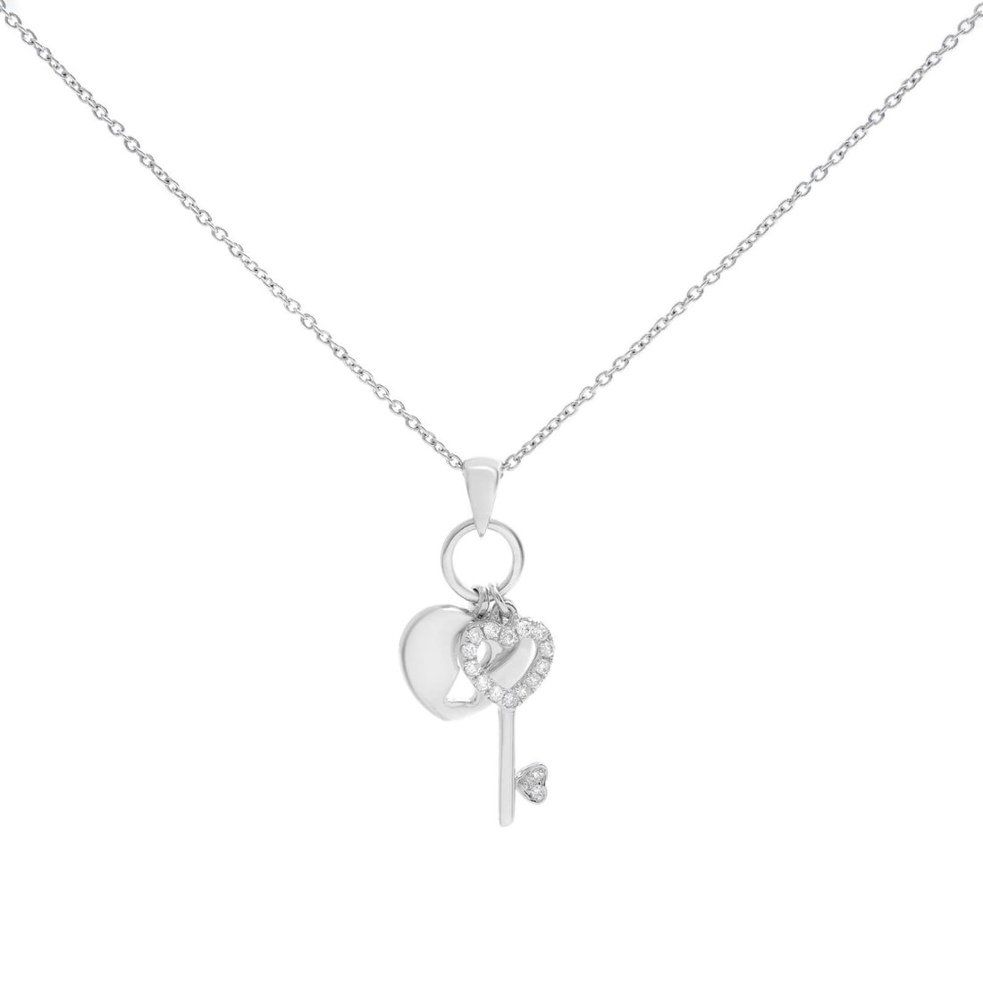 Piero Milano 18k White Gold Diamond Heart Lock Key Necklace 0.09cttw: Piero Milano 18k White Gold Diamond Heart Lock Key Necklace 0.09cttw This exquisite Piero Milano Heart Lock & Key Necklace showcases a captivating design in 18k white gold, perfect for commemorating s