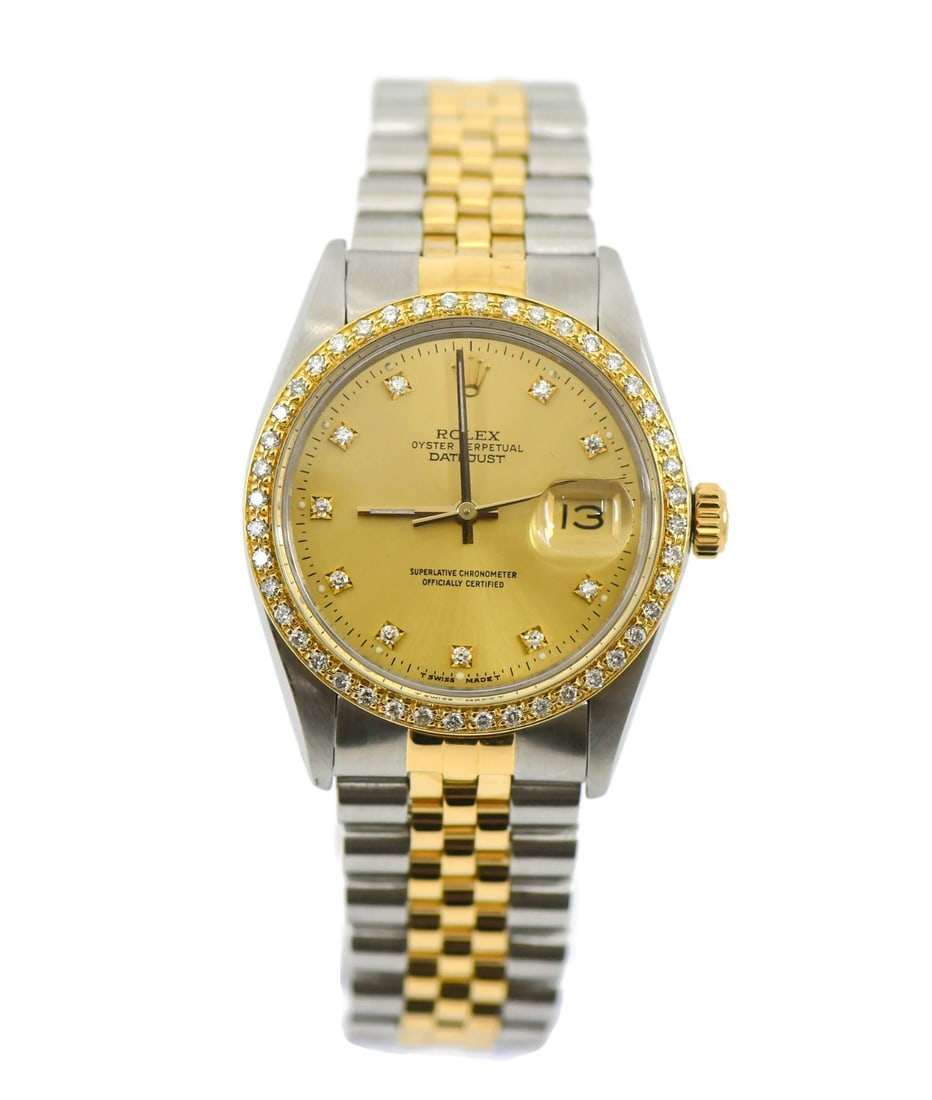 Rolex Champagne Dial Datejust 16013 Watch with Diamonds 18K and Steel 36mm: Rolex Champagne Dial Datejust 16013 Watch with Diamonds 18K and Steel 36mm This Rolex Datejust wristwatch, reference 16013, features a 36 mm stainless steel case accented with 18K gold and a champagne
