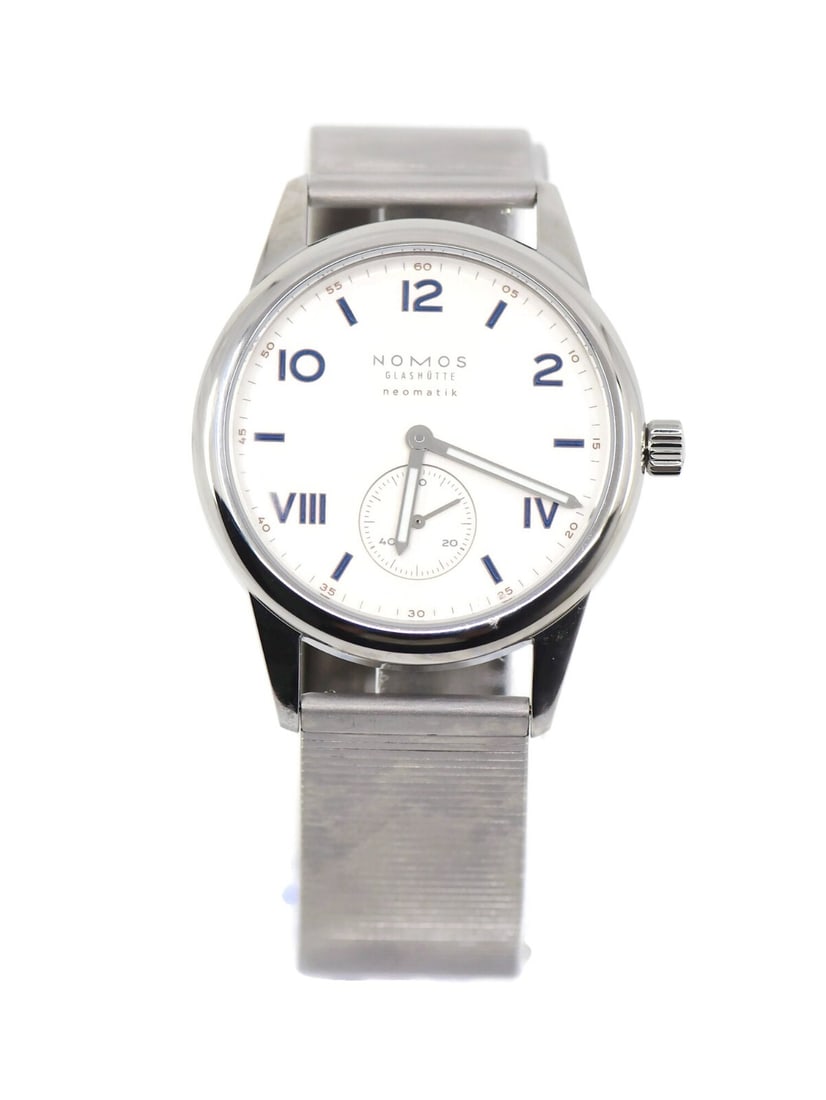 NOMOS Club Campus Stainless Steel Watch 765 with Box and Papers: NOMOS Club Campus Stainless Steel Watch 765 with Box and Papers Discover the elegance of the NOMOS Club Campus Stainless Steel Watch, model 765. This wristwatch features a sleek silver dial housed in 