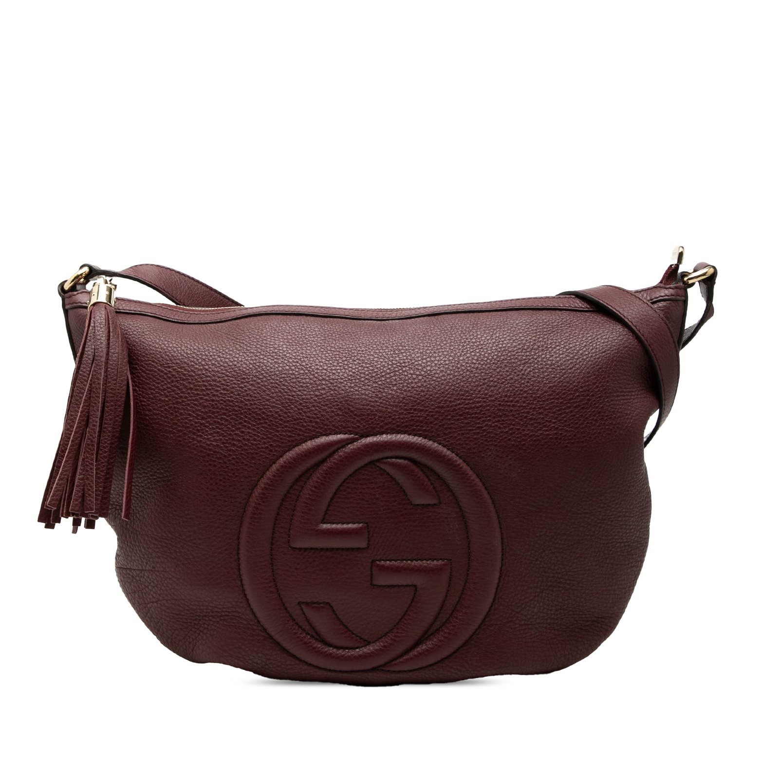 Gucci Soho Medium Leather Crossbody Bag Red: Gucci Soho Medium Leather Crossbody Bag Red Gucci Medium Leather Soho Crossbody in red leather with a zip-top closure and tassel detail. The bag features an adjustable flat leather shoulder strap and 
