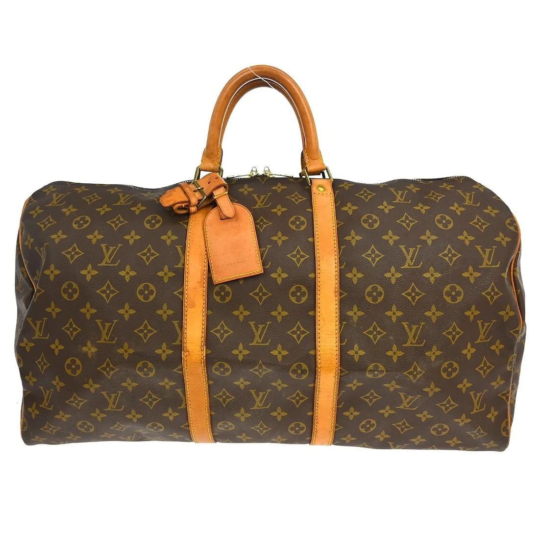Louis Vuitton Keepall Unisex Brown Canvas Travel Bag: Louis Vuitton Keepall Unisex Brown Canvas Travel Bag Louis Vuitton Keepall in brown monogram canvas. This unisex travel bag is made in France and remains in good condition with visible wear from use. 