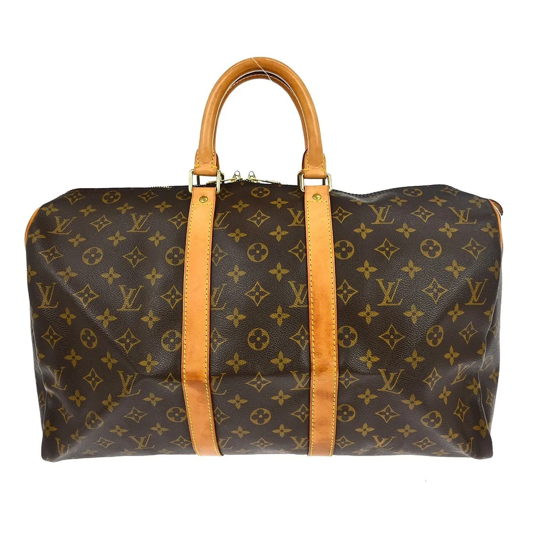 Louis Vuitton Keepall Travel Bag in Brown Monogram Canvas: Louis Vuitton Keepall Travel Bag in Brown Monogram Canvas Louis Vuitton Keepall in brown monogram canvas. This unisex bag is made in France and is presented in fair condition with visible wear. The ex