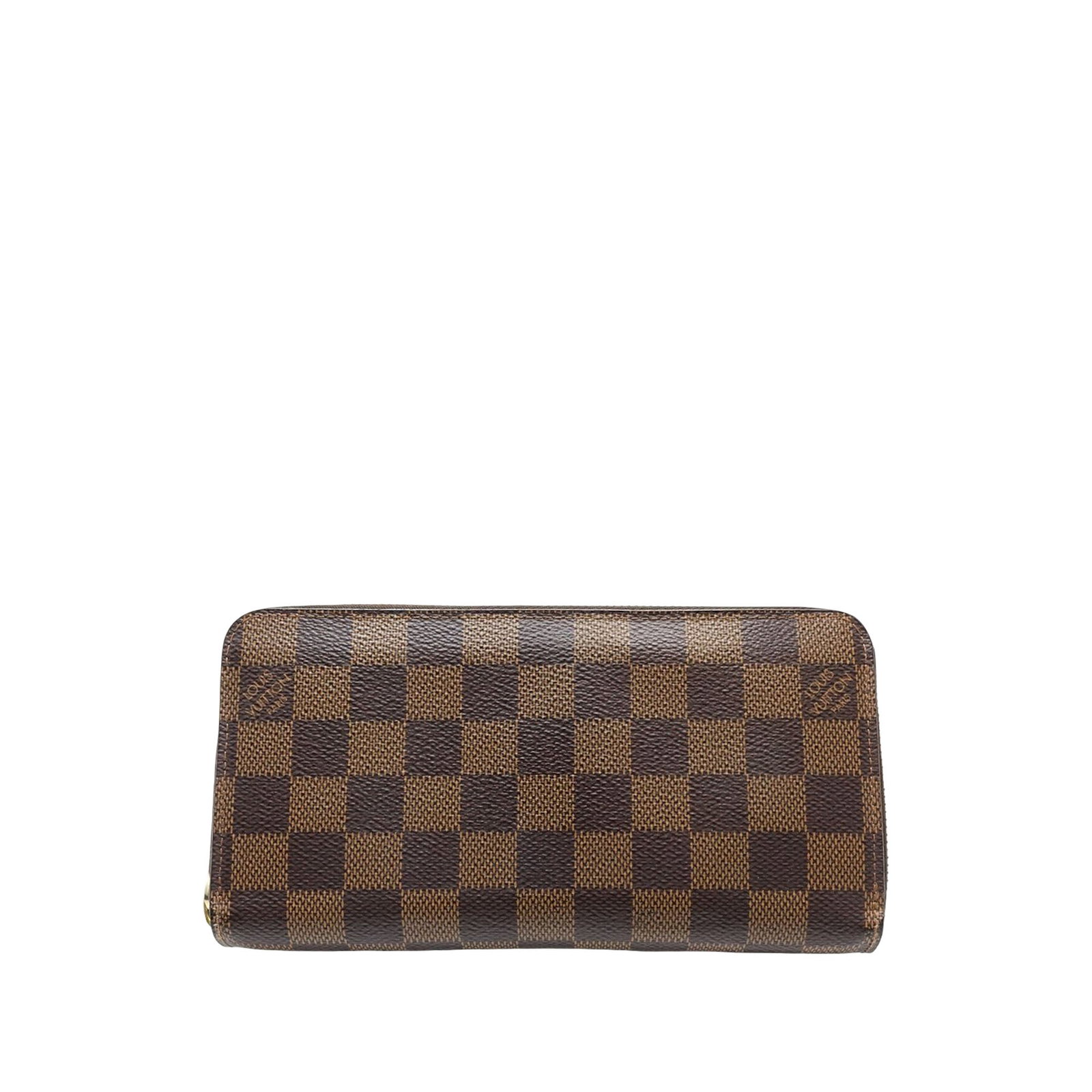 Louis Vuitton Zippy Long Wallet in Damier Ebene Canvas: Louis Vuitton Zippy Long Wallet in Damier Ebene Canvas Louis Vuitton Damier Ebene Zippy Long Wallet in brown fabric with a zip-around closure. The interior includes a zip compartment and slip pockets.