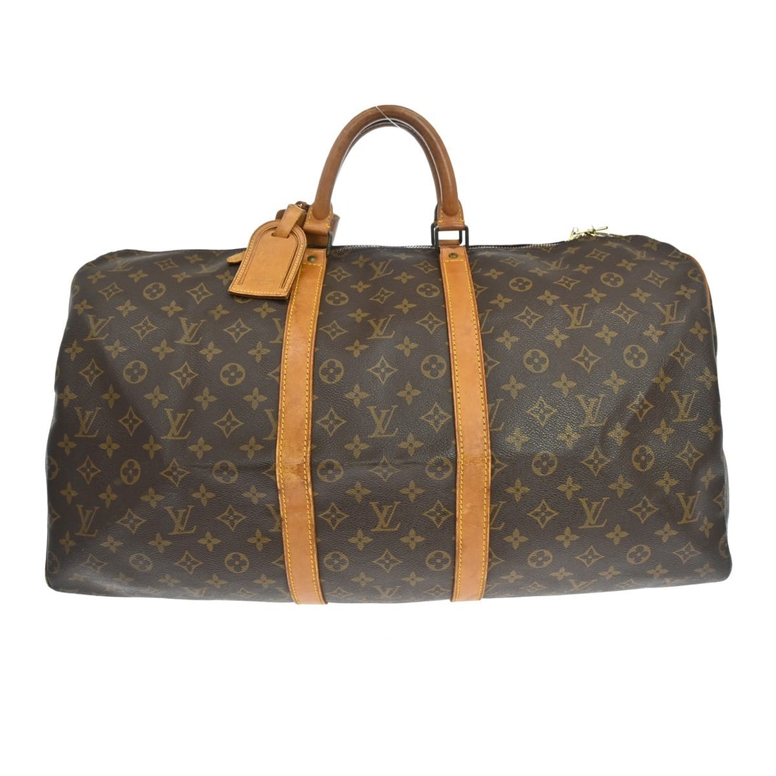 Louis Vuitton Keepall 55 Monogram Canvas Duffle Bag M41424: Louis Vuitton Keepall 55 Monogram Canvas Duffle Bag M41424 Vintage Louis Vuitton Keepall 55 travel handbag in the Monogram pattern with double leather handles and zip closure. This extra large duffle-
