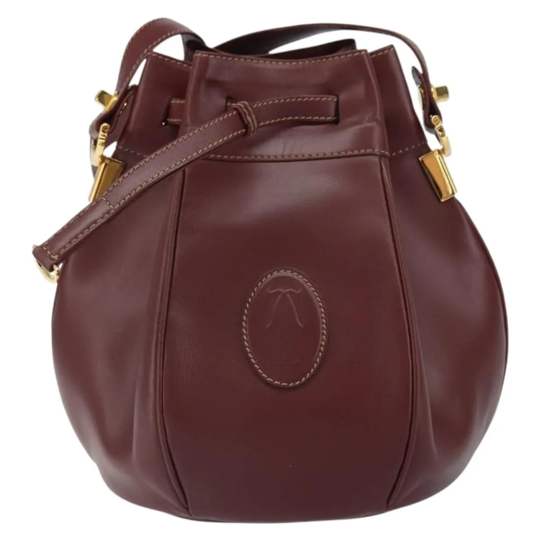 Cartier Must de Cartier Burgundy Leather Shoulder Bag: Cartier Must de Cartier Burgundy Leather Shoulder Bag Cartier Must de Cartier leather bag in burgundy. Made in Spain, this piece is designed for women and is presented in good condition with light rub