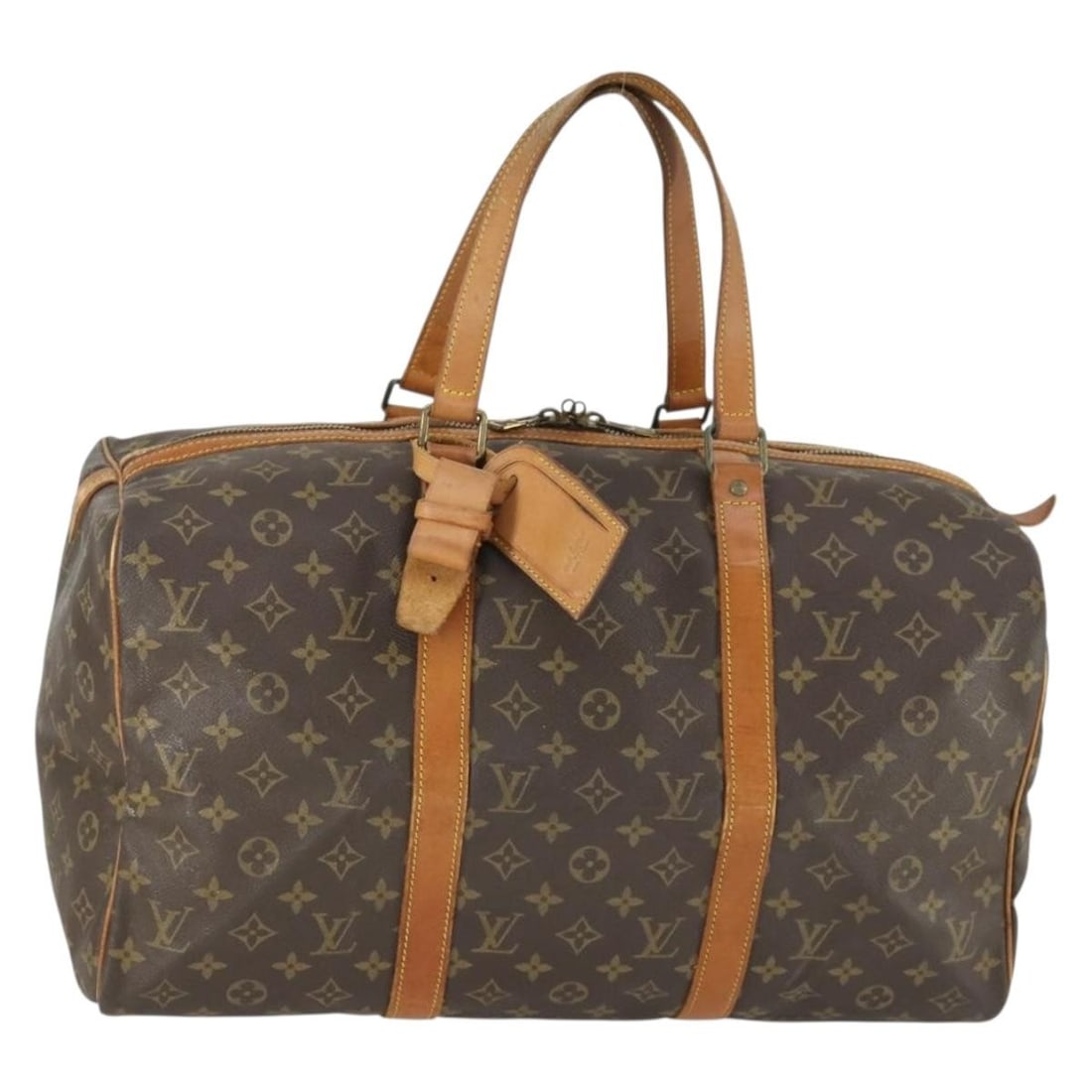 Louis Vuitton Sac Souple 45 Monogram Canvas Boston Bag M41624 with Name Tag: Louis Vuitton Sac Souple 45 Monogram Canvas Boston Bag M41624 with Name Tag This Louis Vuitton Monogram Sac Souple 45 Boston Bag features the iconic monogram canvas exterior with classic styling. The 