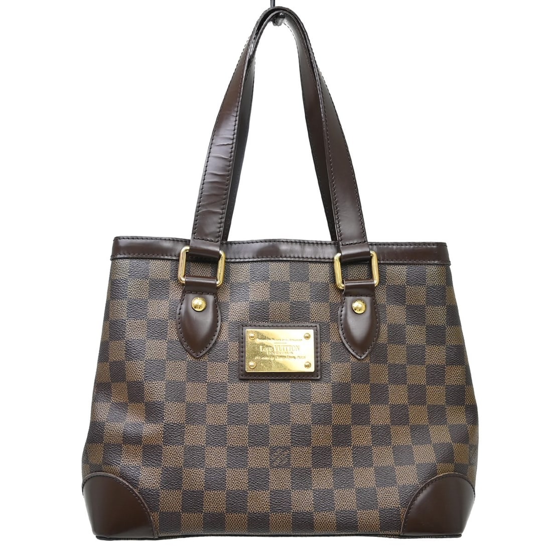 Louis Vuitton Hampstead PM Damier Ebene Tote Bag N51205: Louis Vuitton Hampstead PM Damier Ebene Tote Bag N51205 Vintage Louis Vuitton Hampstead PM hand tote bag in Damier Ebene. This medium tote features double handles, a hook-and-loop closure, inner pocke