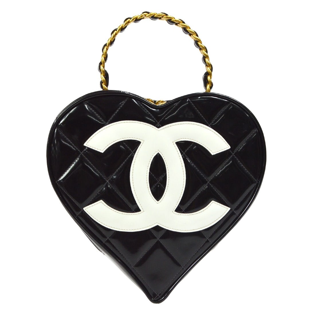 Chanel Quilted Heart Vanity Cosmetic Bag in Black Patent Leather: Chanel Quilted Heart Vanity Cosmetic Bag in Black Patent Leather Chanel Heart cosmetic chain vanity handbag in black and white patent leather with matelasse quilting and logo accents. Designed with a 