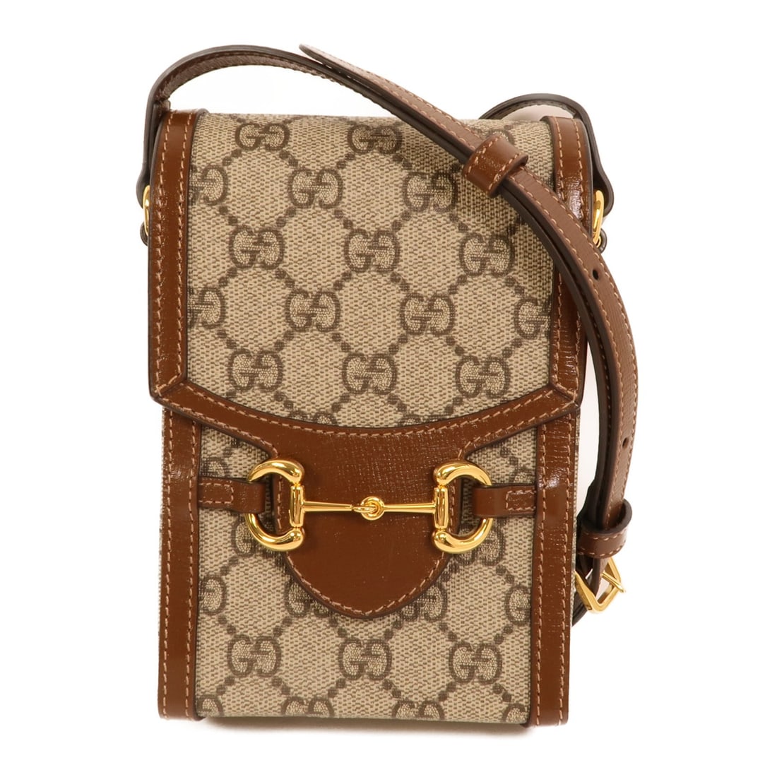 Gucci Horsebit 1955 Mini Brown PVC Coated Canvas Shoulder Bag: Gucci Horsebit 1955 Mini Brown PVC Coated Canvas Shoulder Bag This Gucci Horsebit 1955 Mini Shoulder Bag features a brown PVC coated canvas exterior with gold-tone hardware and the iconic GG motif. Cr