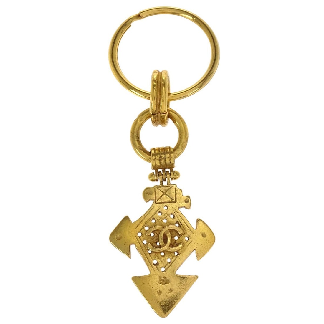 Chanel 94P Gold Plated Keyring Bag Charm France: Chanel 94P Gold Plated Keyring Bag Charm France Chanel gold-plated keyring with a small cross bag charm. Made in France, this women's accessory has a gold-tone finish and shows scuffs consistent with 