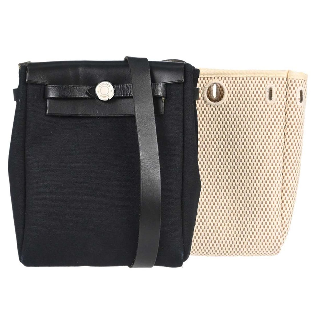 Hermes Herbag TPM 2 in 1 Black Toile Officier Shoulder Bag: Hermes Herbag TPM 2 in 1 Black Toile Officier Shoulder Bag Hermes Herbag TPM 2 in 1 shoulder bag in black and natural Toile Officier, Toile GM, and leather. This women's bag features a flap closure, c