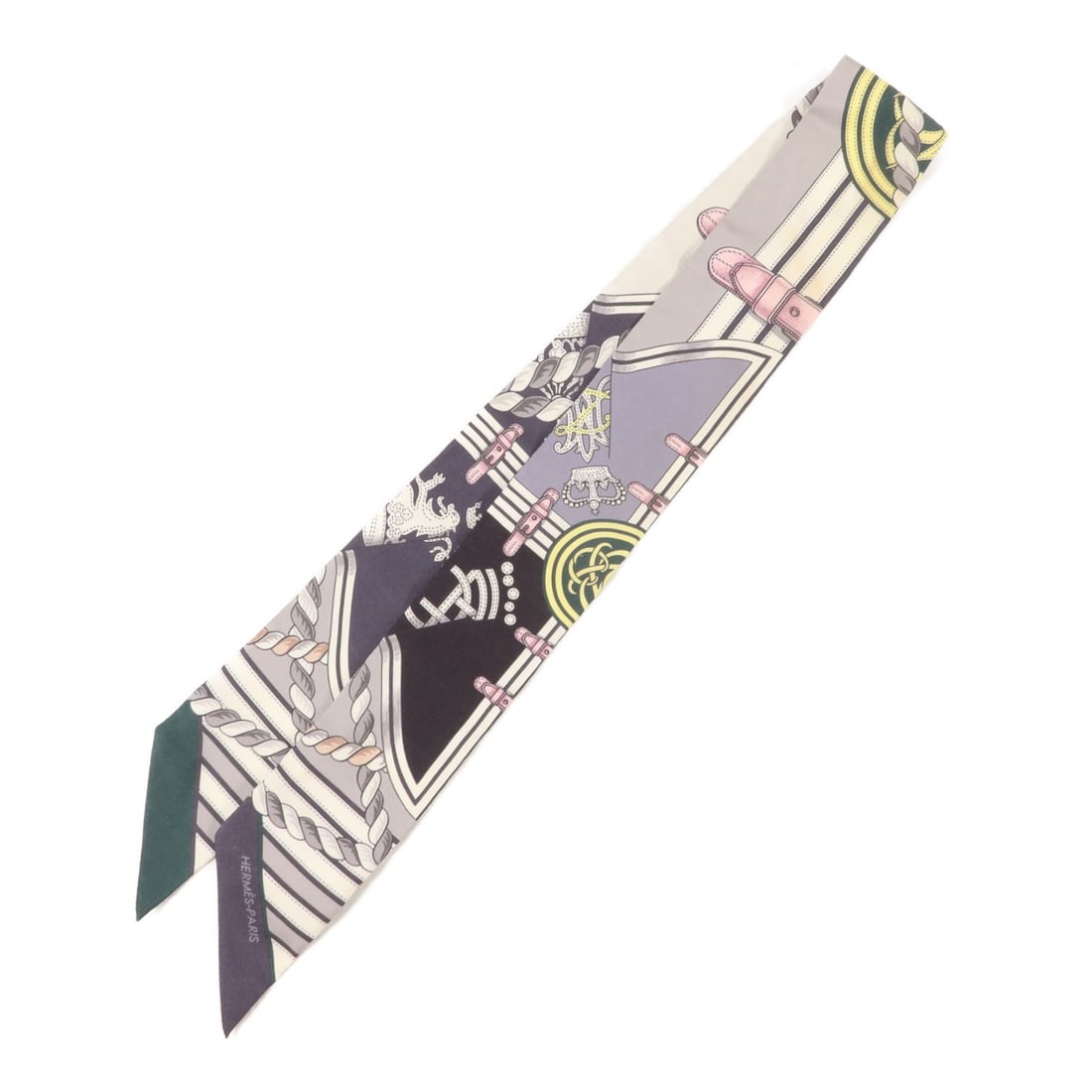 Hermes silk gray Twilly scarf: Hermes silk gray Twilly scarf This Hermes Twilly scarf is crafted from luxurious silk in a gray and white color palette. Designed for women, it features a classic scarf style and is made in France. Th
