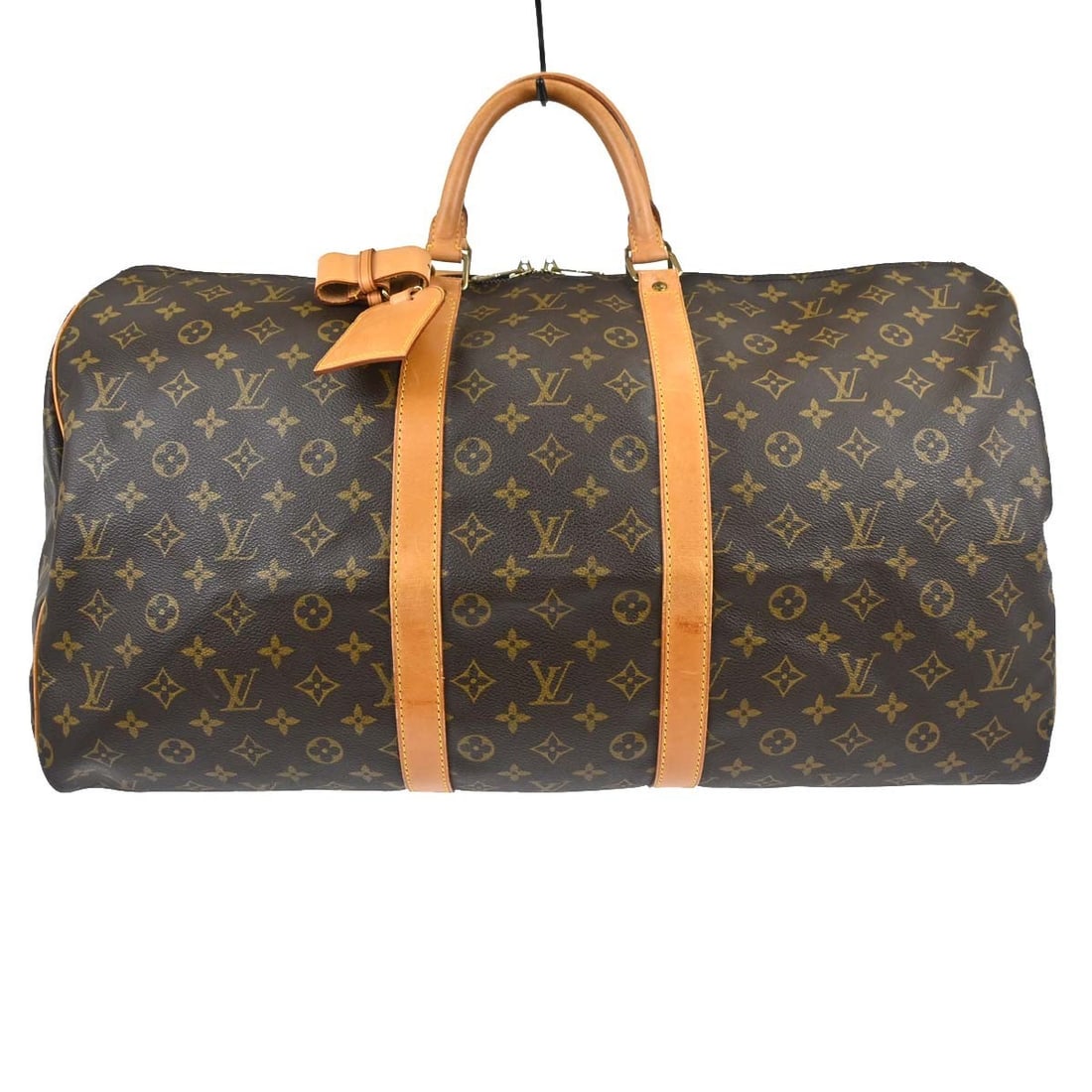 Louis Vuitton Keepall 55 Monogram Canvas Duffle Bag M41424: Louis Vuitton Keepall 55 Monogram Canvas Duffle Bag M41424 Vintage Louis Vuitton Keepall 55 travel handbag in Monogram canvas with leather trim and double handles. This extra-large duffle-style bag fe