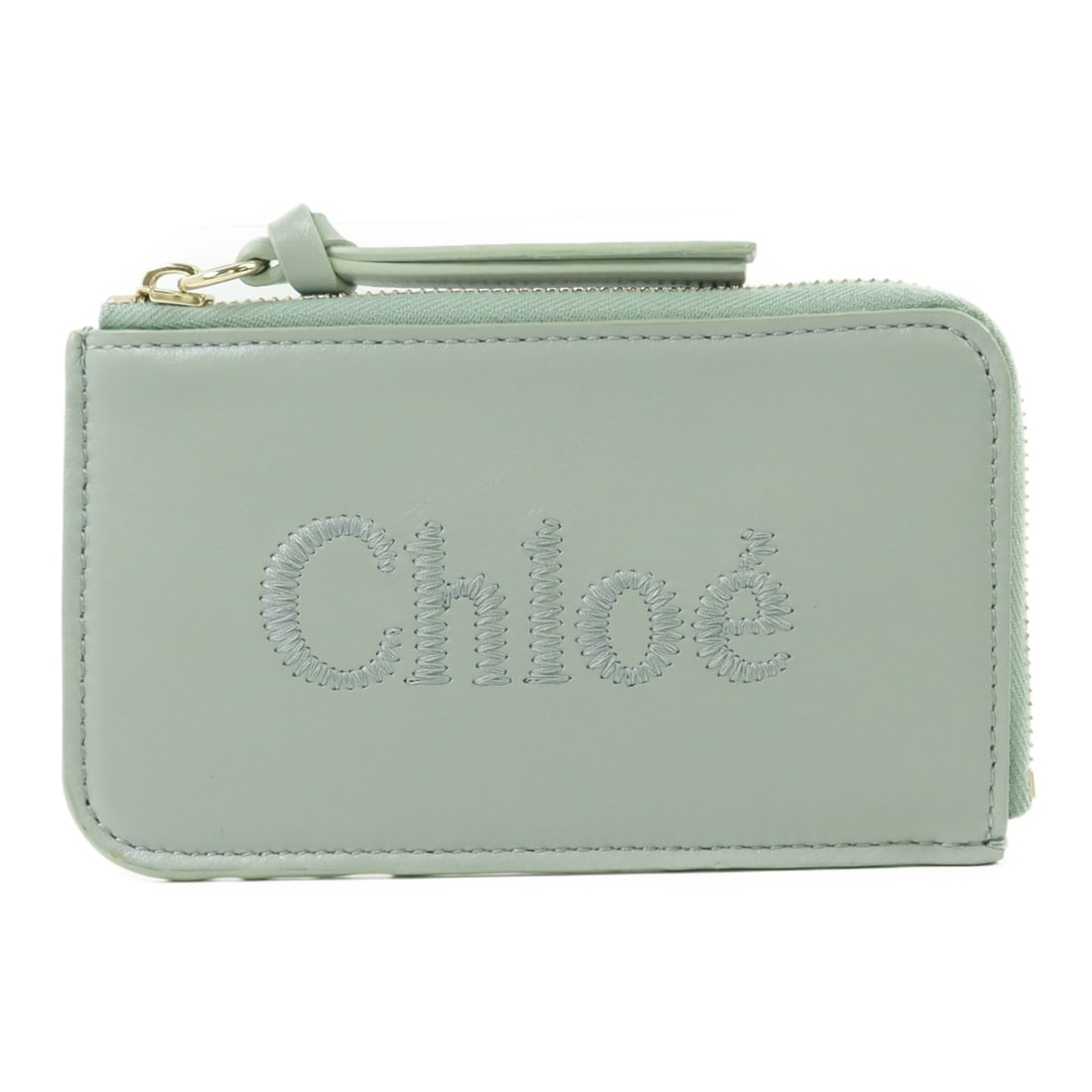 Chloe Green Lambskin Leather Card Case GHW: Chloe Green Lambskin Leather Card Case GHW This elegant card case from Chloe is crafted from high-quality lambskin leather, offering a luxurious feel and stylish appearance. Its striking green color i