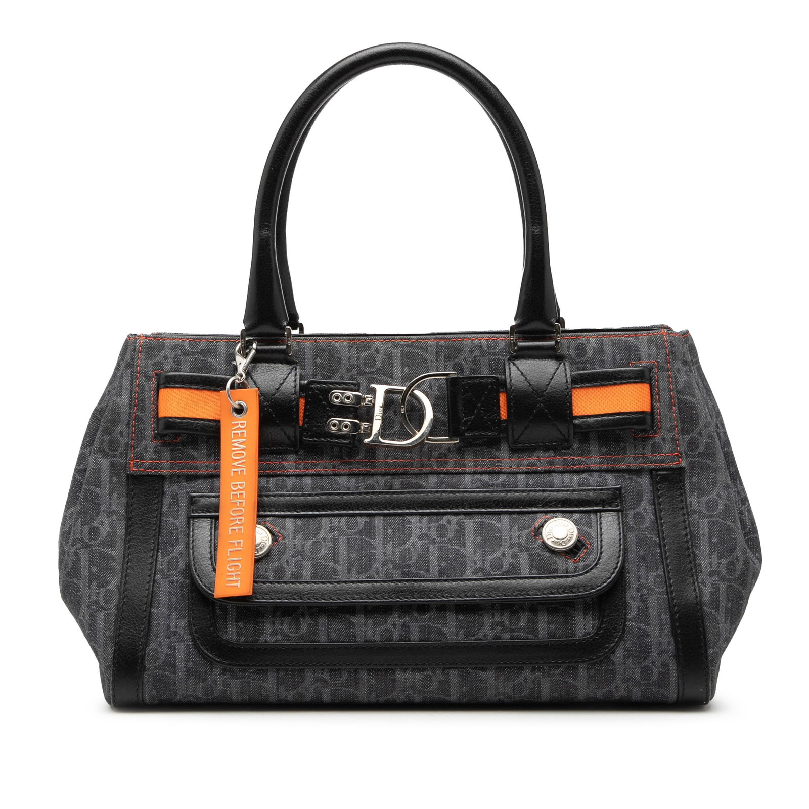 Dior denim Flight tote bag Trotter: Dior denim Flight tote bag Trotter This Diorissimo Trotter Denim Flight Handle Bag features a blue denim body complemented by rolled leather straps. The bag is designed with an open top secured by a m