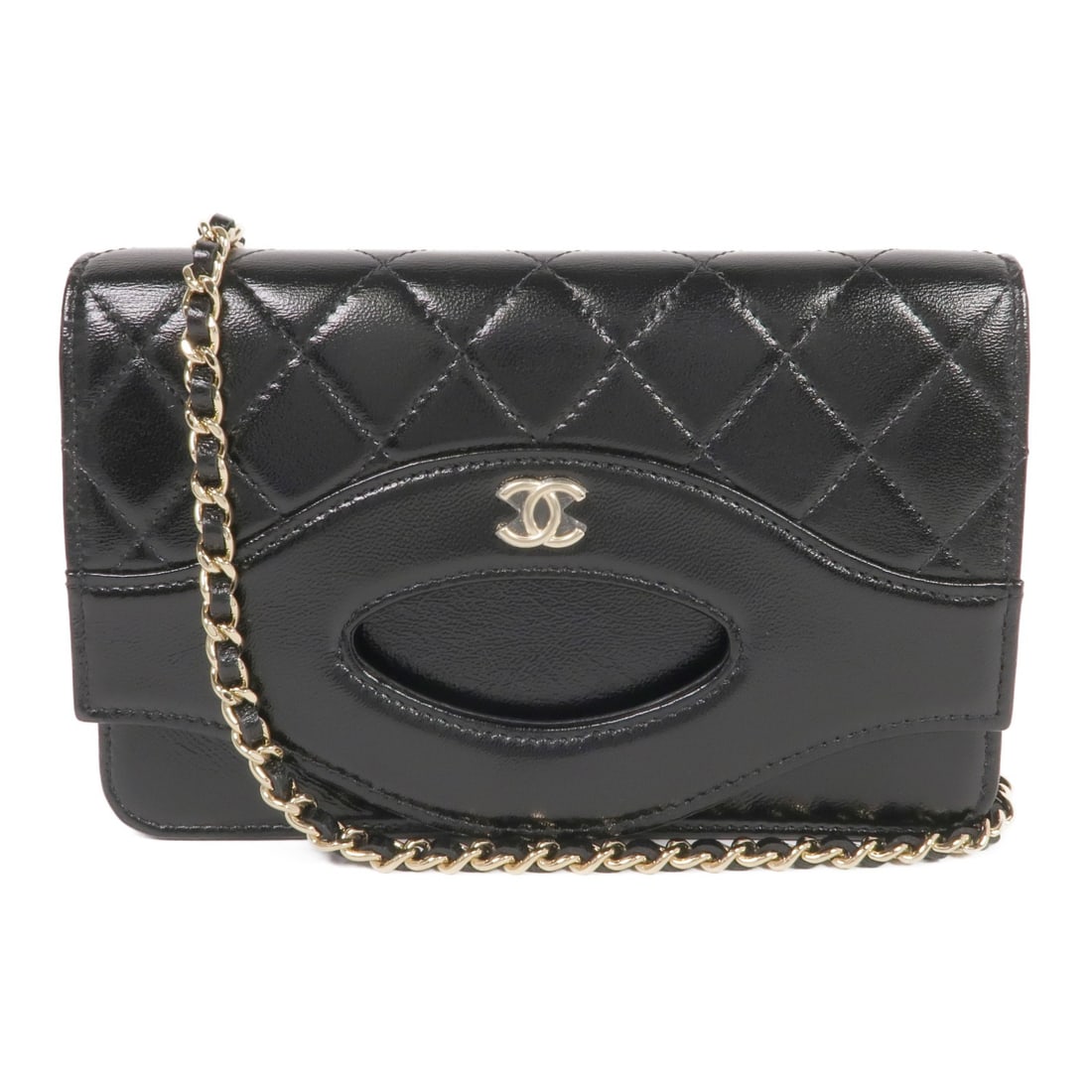 CHANEL CC GHW 31 WOC Black Calfskin Shoulder Bag: CHANEL CC GHW 31 WOC Black Calfskin Shoulder Bag This elegant CHANEL Wallet On Chain (WOC) shoulder bag features a luxurious black calfskin leather exterior, showcasing the iconic CC logo in gold hard