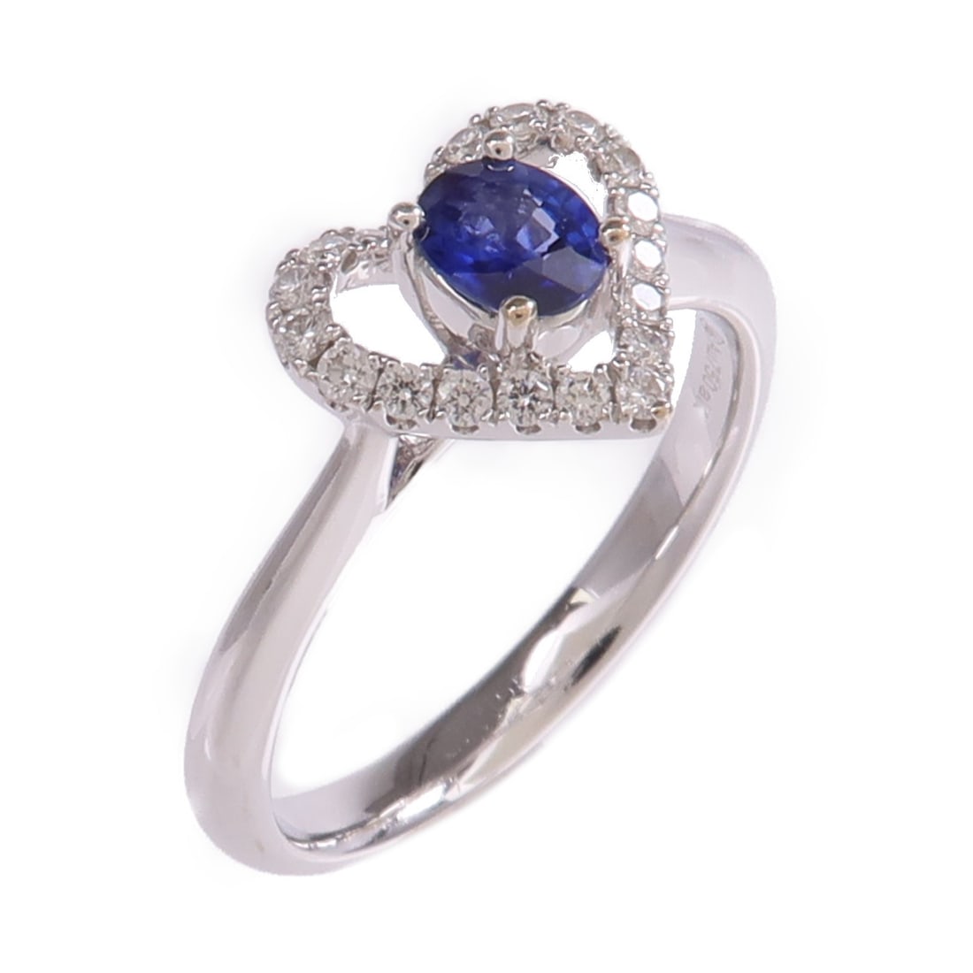 Sapphire and Diamond Ring in 18K White Gold Size US 6: Sapphire and Diamond Ring in 18K White Gold Size US 6 This elegant women's ring features a striking blue sapphire as the main stone, set in 18K white gold. The sophisticated design is enhanced by spar