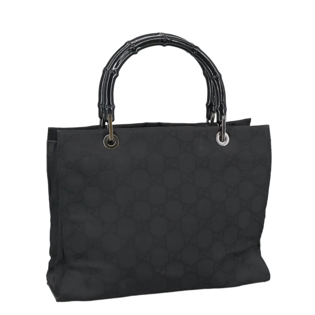Gucci Vintage Bamboo Handle Black Nylon Tote: Gucci Vintage Bamboo Handle Black Nylon Tote This Gucci Vintage Bamboo Handle Tote features the iconic bamboo handles and is crafted from black GG nylon. Designed for women, it offers a spacious inter
