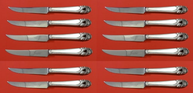 International Spring Glory 12pc Sterling Silver Steak Knife Set 8.5": International Spring Glory 12pc Sterling Silver Steak Knife Set 8.5" Introducing the Spring Glory Custom Set of 12 Steak Knives by International Sterling. Each knife features a beautiful sterling silv
