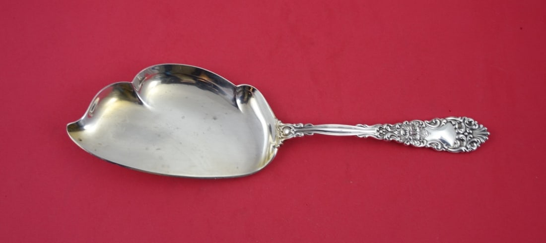 Dominick & Haff Renaissance Sterling Silver Fish Server 10.75": Dominick & Haff Renaissance Sterling Silver Fish Server 10.75" This exquisite fish server from the Renaissance pattern by Dominick & Haff showcases the elegance of 19th-century design. Crafted from