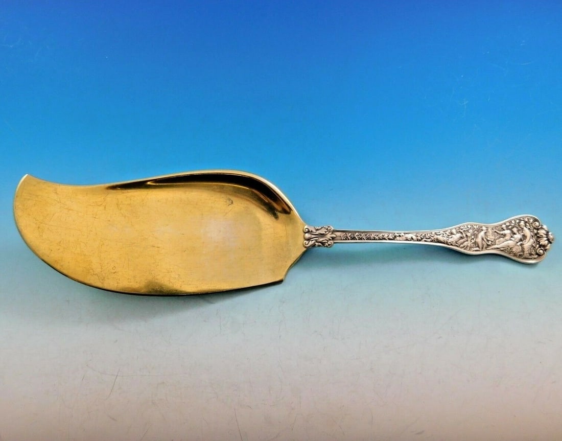 Tiffany & Co Olympian Sterling Silver Ice Cream Server 11 3/8" Antique: Tiffany & Co Olympian Sterling Silver Ice Cream Server 11 3/8" Antique Introducing the stunning Olympian Ice Cream Server by Tiffany & Co., crafted from exquisite sterling silver. Measuring 11 3/8 inc