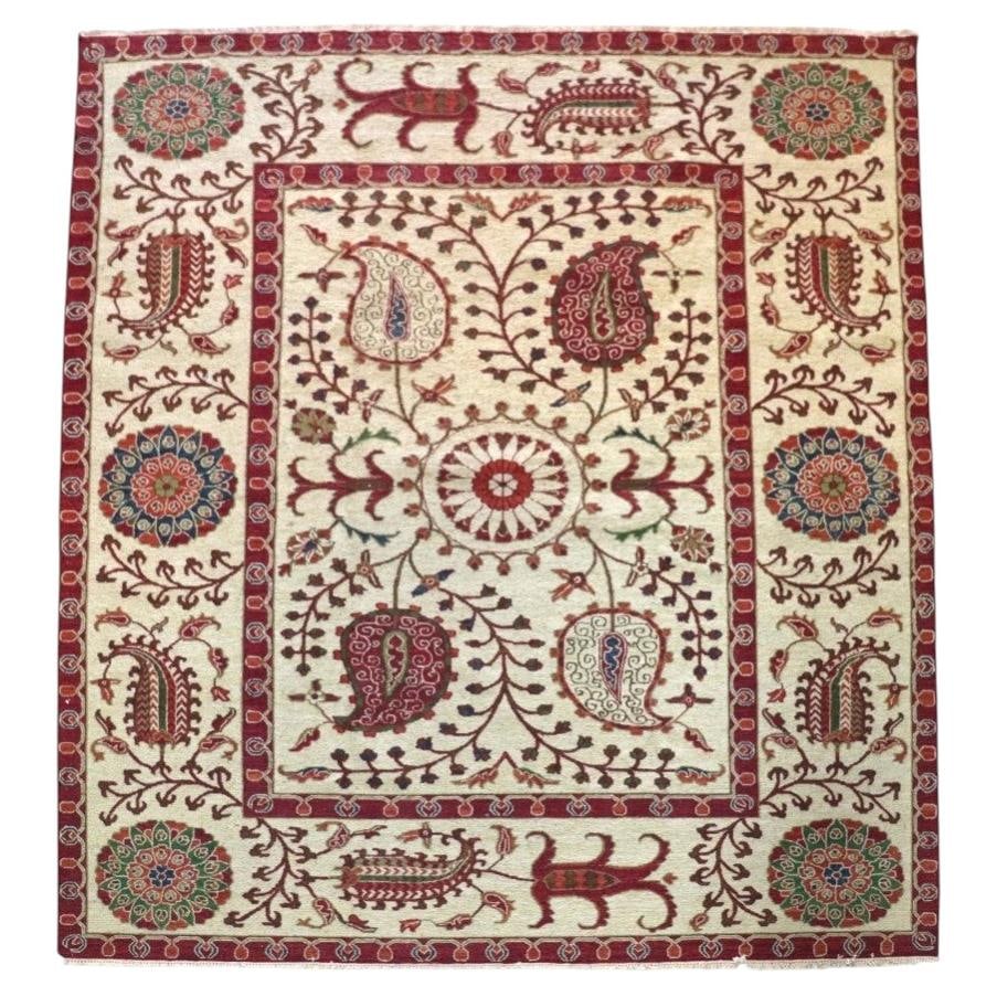 20th Century Wool Suzani-Style Oriental Rug 97 x 117.25 in: 20th Century Wool Suzani-Style Oriental Rug 97 x 117.25 in This large Suzani-style oriental carpet from the 20th century is hand-woven from wool and features an intricate design with a central medalli