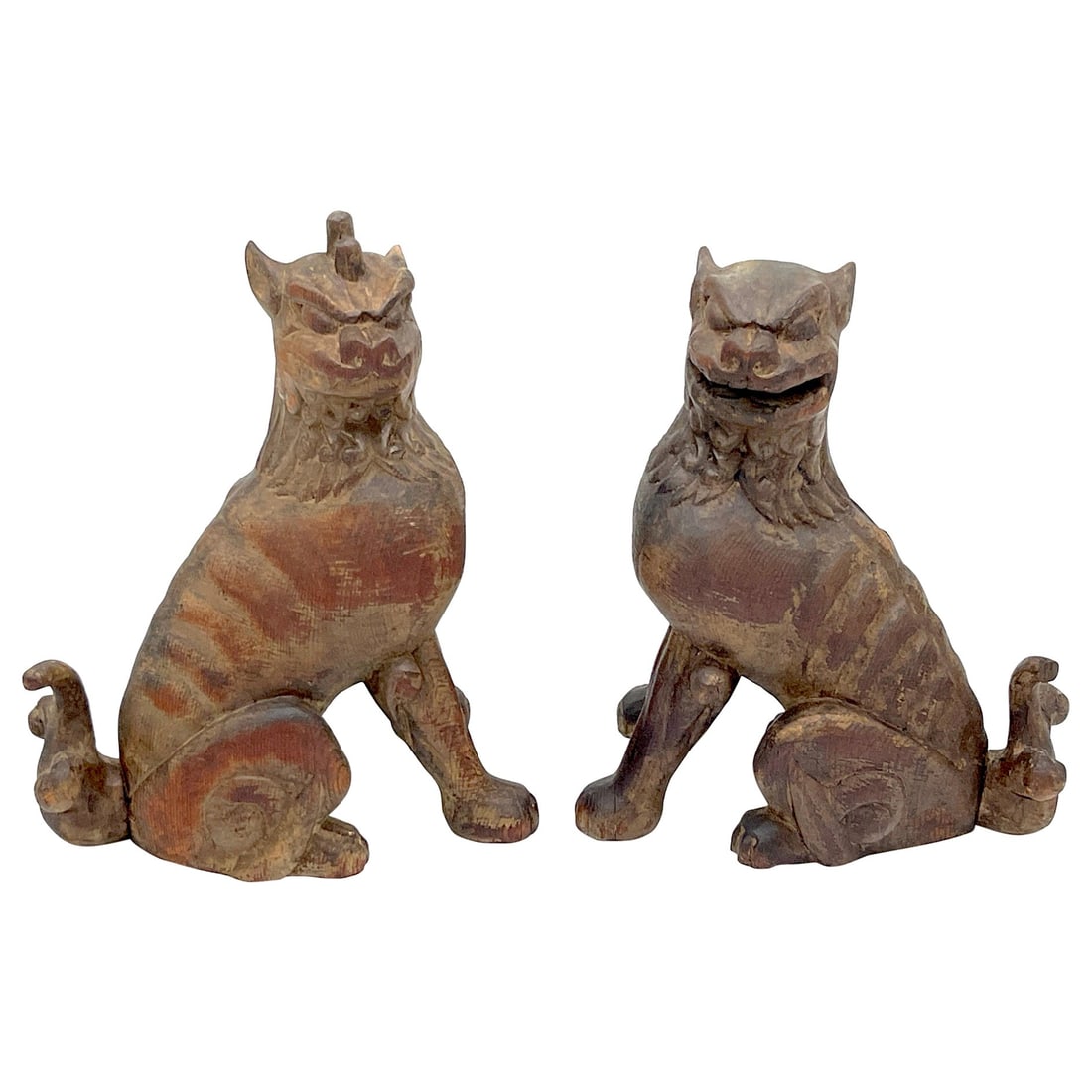 19th Century Tibetan Polychromed Carved Wood Foo Dogs Set of 2: 19th Century Tibetan Polychromed Carved Wood Foo Dogs Set of 2 This enchanting pair of 19th Century Tibetan carved wood and polychromed foo/guardian/temple dogs embodies the rich spiritual heritage of