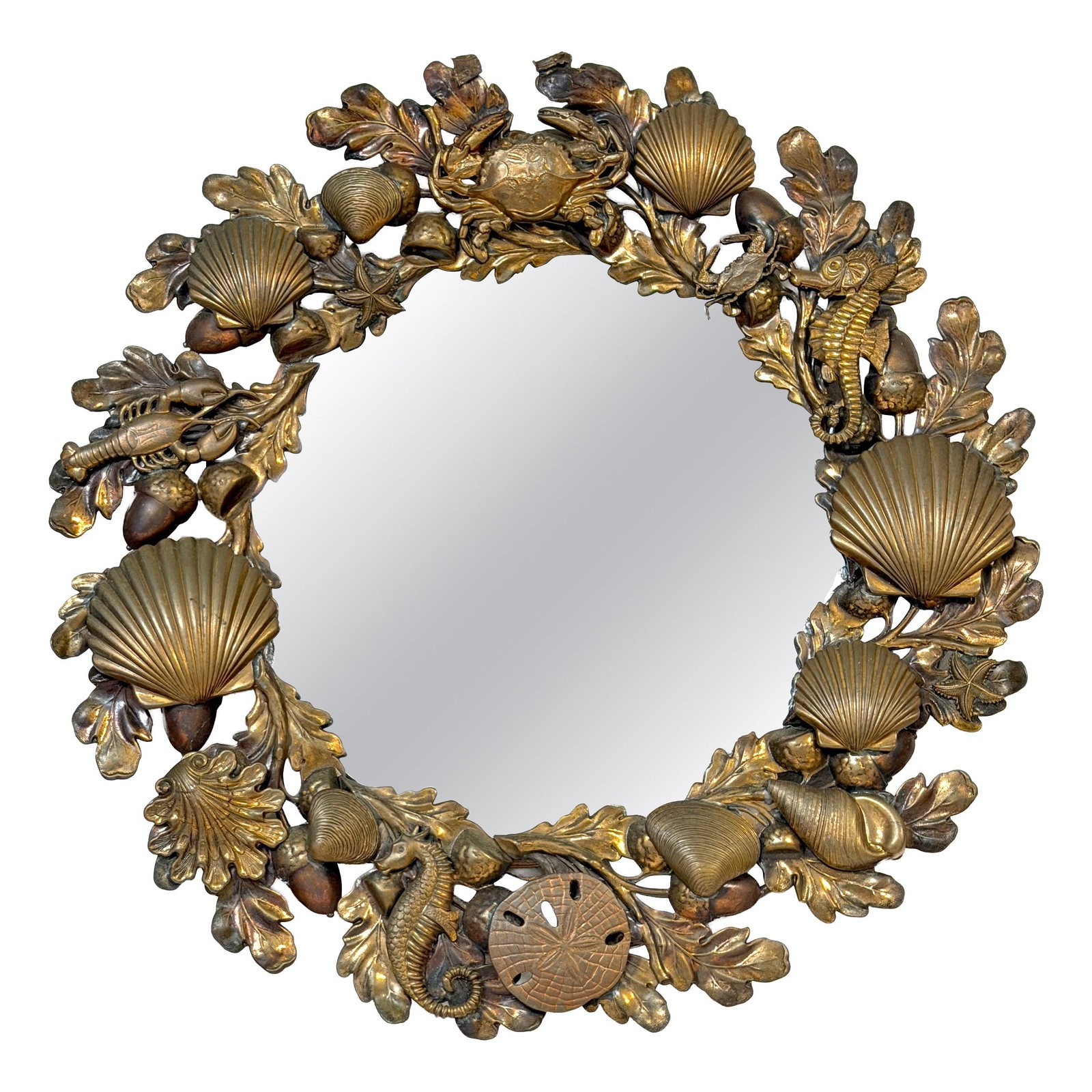 Aesthetic Movement Brass Marine Motif Mirror with Shells and Seahorses England 1890s: Aesthetic Movement Brass Marine Motif Mirror with Shells and Seahorses England 1890s This Victorian circular mirror from late 19th-century England features an ornate cast brass frame with a warm, aged