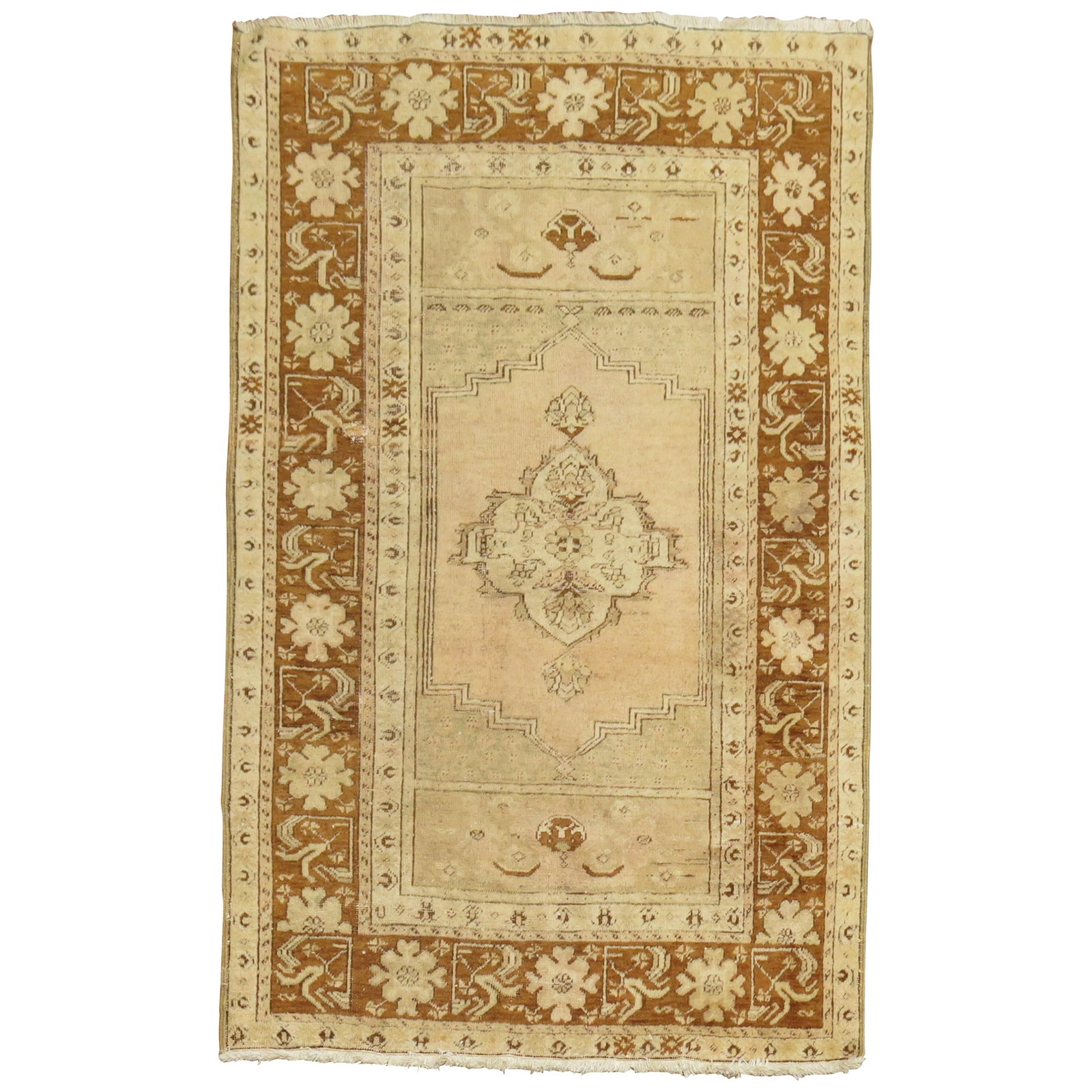 Turkish Oushak Wool Hand Woven Rug 42 x 56 in: Turkish Oushak Wool Hand Woven Rug 42 x 56 in This Turkish Oushak rug features a soft pink salmon hue and was hand-woven from wool in the mid-20th century, circa 1940. Its Pre-Raphaelite style adds a 