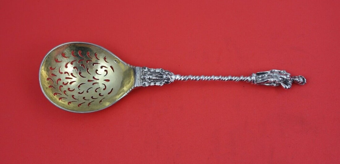 Victorian Sterling Silver Sugar Sifter London 1861 GRE 7 1/2 in: Victorian Sterling Silver Sugar Sifter London 1861 GRE 7 1/2 in This exquisite English Victorian sterling silver sugar sifter, crafted in London in 1861, features a stunning 3-dimensional figural hand