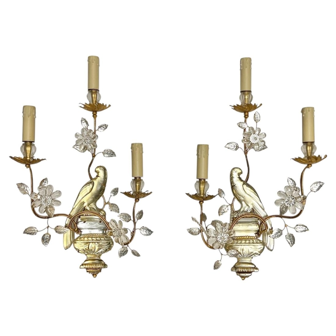 Set of 2 Italian Parrot Glass Gilt Metal Wall Lights: Set of 2 Italian Parrot Glass Gilt Metal Wall Lights This pair of Mid-Century Modern Italian wall sconces features gilt metal construction with glass parrot figures, glass leaves, and faux wax candle 