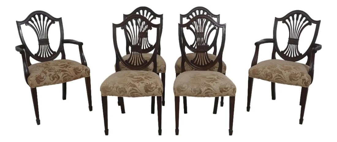 Six Mahogany Federal Style Shield Back Dining Chairs: Six Mahogany Federal Style Shield Back Dining Chairs This set includes six Stickley shield back dining room chairs crafted from mahogany. Designed in a Federal and traditional style, these chairs feat
