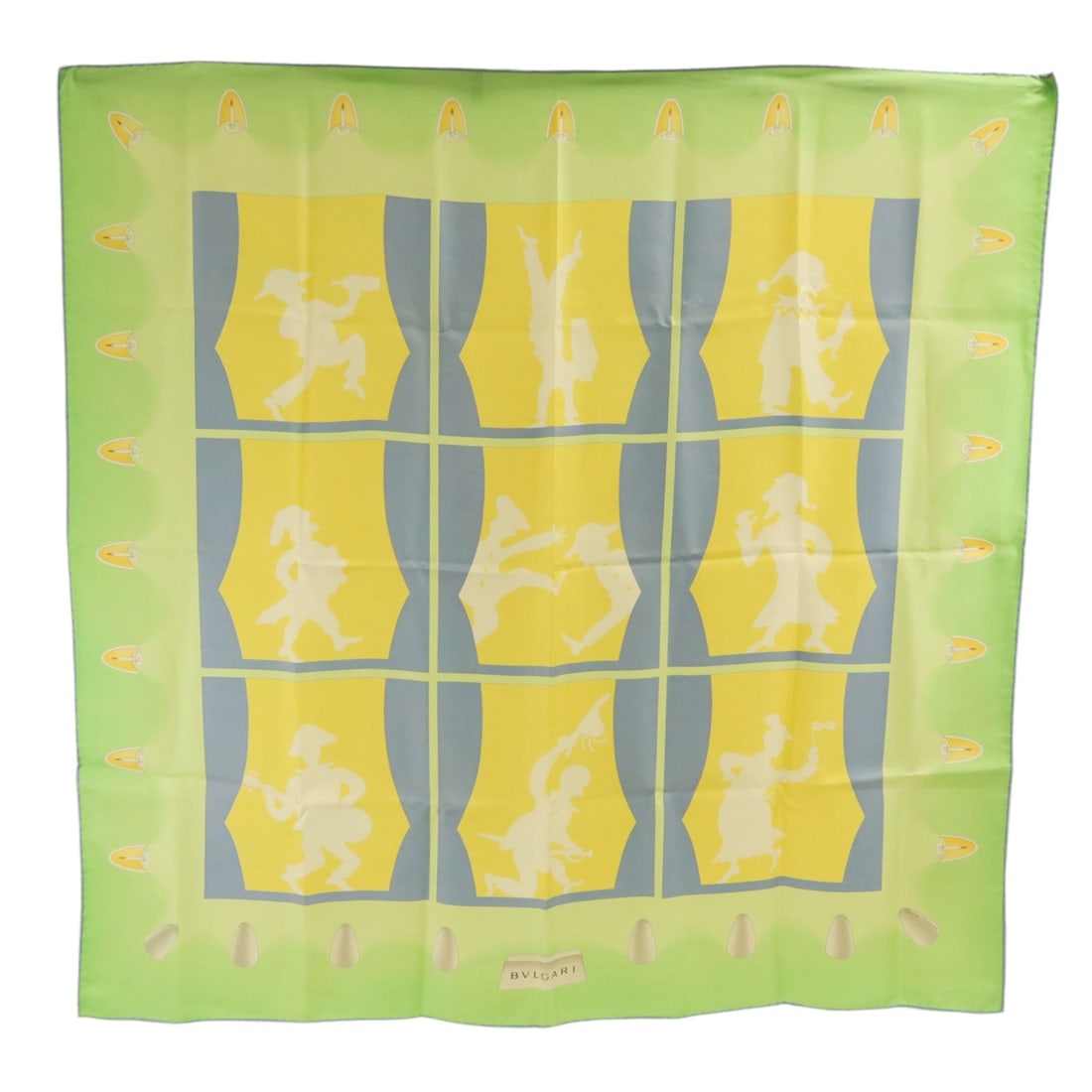 BVLGARI Silk Scarf Multicolor Green Yellow Blue: BVLGARI Silk Scarf Multicolor Green Yellow Blue This BVLGARI women's scarf features a vibrant combination of green, yellow, and blue hues. Crafted from silk, it offers a luxurious feel and sophisticat