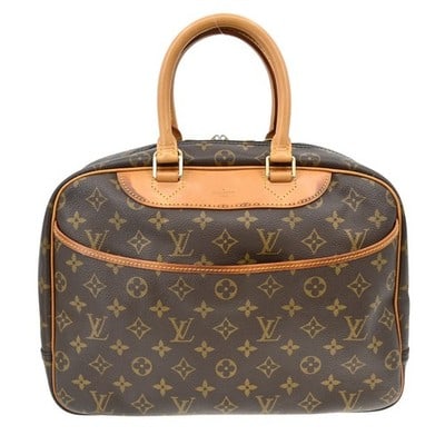 Louis Vuitton M47270 Deauville Monogram Canvas Vanity Bag: Louis Vuitton M47270 Deauville Monogram Canvas Vanity Bag Vintage Louis Vuitton Deauville bowling vanity handbag in Monogram canvas with leather trim. The bag features one exterior pocket and four int