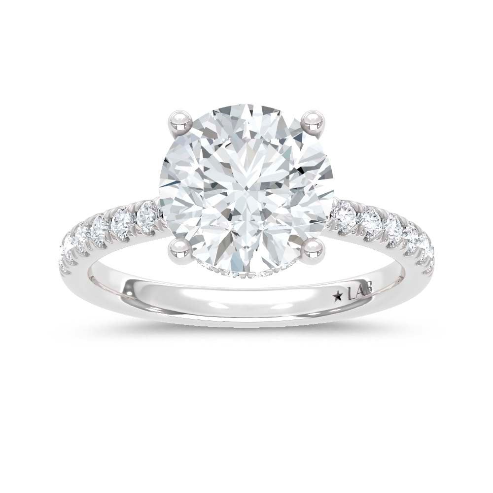 14K White Gold Lab Grown Diamond 3 3/8 Ct.Tw. Round Hidden Halo Engagement Ring (IGI Certified: 14K White Gold Lab Grown Diamond 3 3/8 Ct.Tw. Round Hidden Halo Engagement Ring (IGI Certified Center 3ct) Discover subtle brilliance and modern elegance with our Hidden Halo Diamond Engagement Ring. 