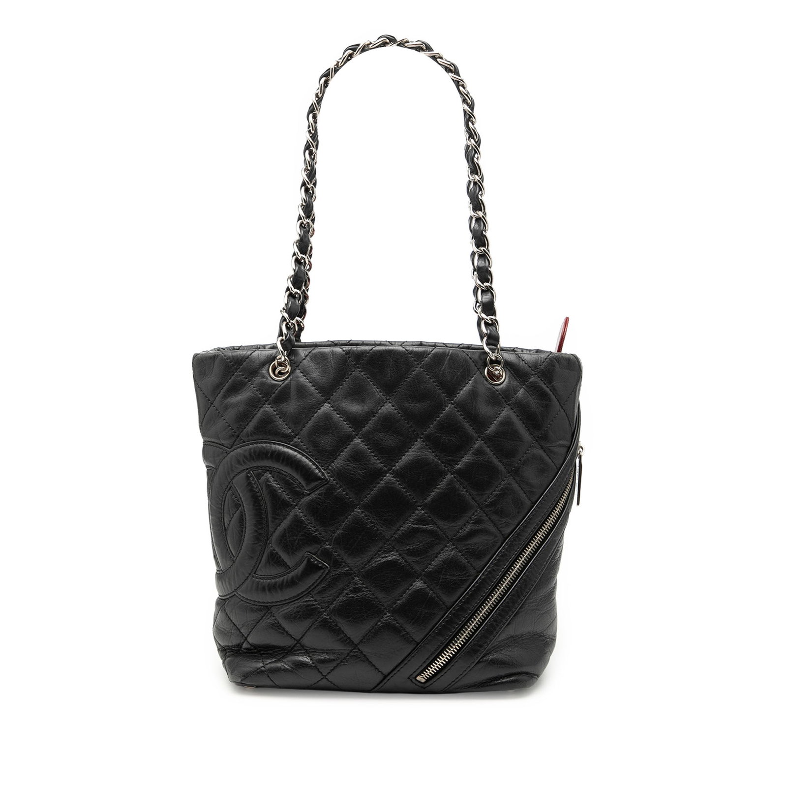 Chanel Cotton Club Small Tote in Quilted Aged Calfskin: Chanel Cotton Club Small Tote in Quilted Aged Calfskin This Chanel Small Quilted Aged Calfskin Cotton Club Tote is a black shoulder bag with a quilted calf leather body, leather-woven chain link strap